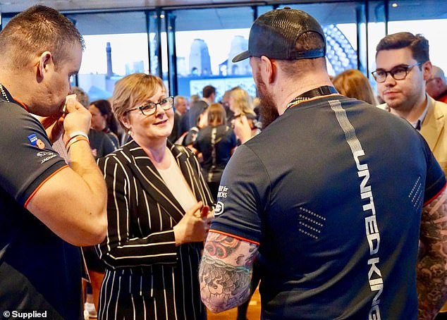 Pictured: Linda Reynolds with Bruce Lehrmann, far right, at the Invictus Games Sydney in 2018