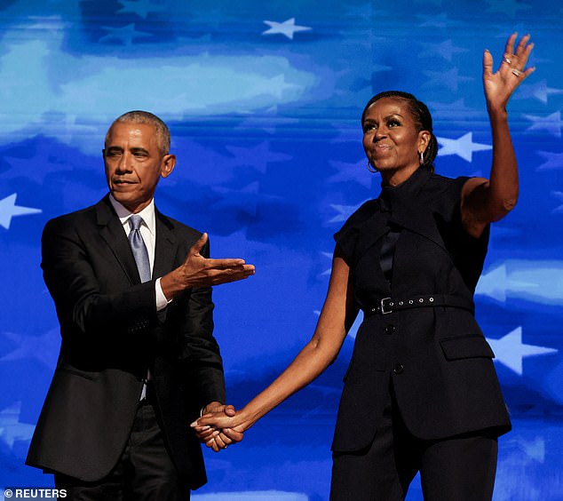 Thousands of wildly enthusiastic Democrats cheered on their political idols Barack and Michelle Obama in what one teary-eyed congressman called 