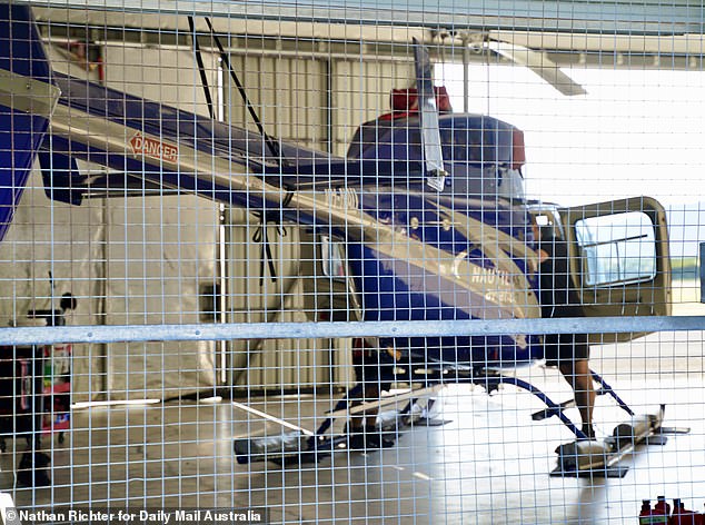 Nautilus helicopter in the hangar where Blake Wilson stole an R44 Robinson aircraft in the early morning hours of Monday and flew it for four minutes before crashing into the Double Tree