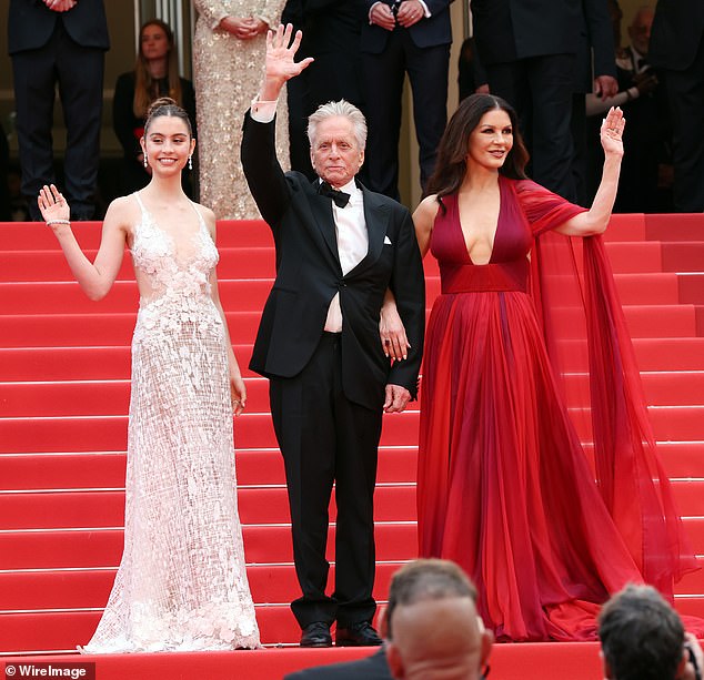 In addition to Dylan, Zeta-Jones and Michael also have a daughter, Carys, 21 (pictured left with her mother and father at last year's Cannes Film Festival)