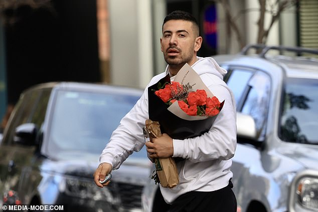 Jono had a concentrated look on his face as he walked to the check-in desk of the exclusive hotel and delivered the flowers and drinks