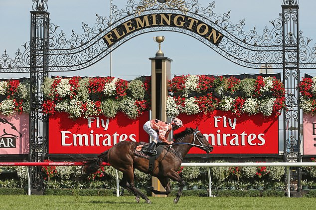 Jockey Luke Nolen rides Black Caviar to win race 7 of the 2013 Black Caviar Lightning Stakes