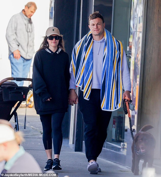 Channel Nine sports presenter Danika Mason and NRL star Liam Knight looked loved up as they took a stroll together in Sydney's Coogee on Sunday