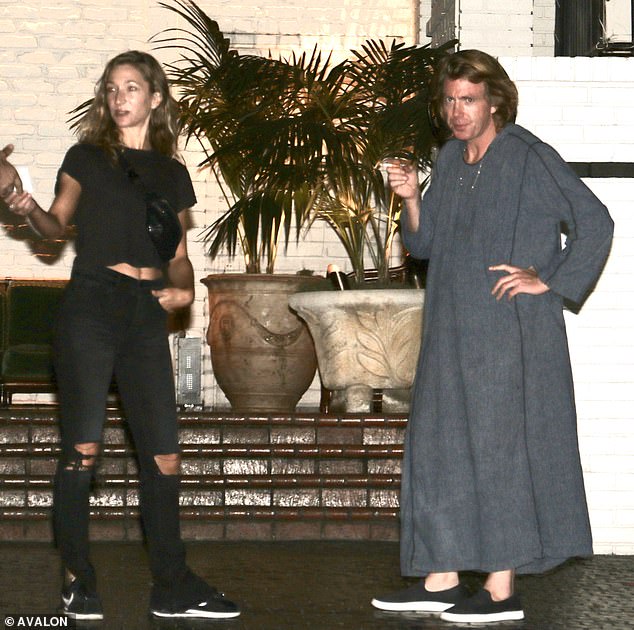 Elijah Blue Allman, 48, Cher's son, was spotted drinking what appeared to be cocktails with an unknown blonde woman at LA hotspot Chateau Marmont while dressed in a bizarre robe-style outfit.