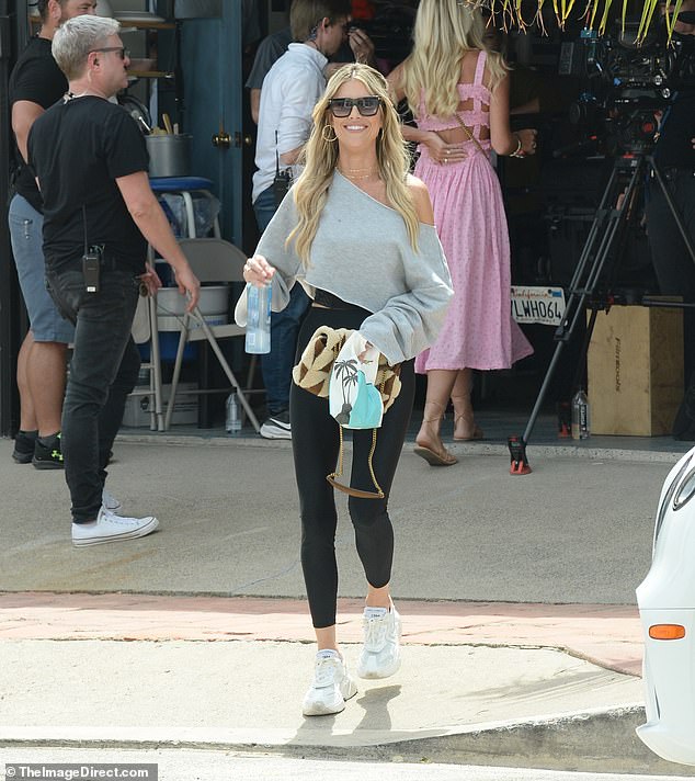 Christina Hall was first spotted on the set of her reality series following news of her split from husband and co-star Josh Hall when she returned to work on the set of The Flip Off in San Clemente, California on Wednesday.