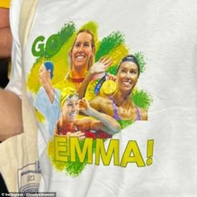 Emma's 4x100m freestyle relay victory on the first night in the pool takes her to six gold medals, one ahead of legend Ian Thorpe. Pictured: A closer look at Cody's special T-shirt