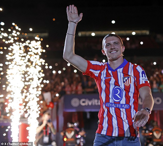 Conor Gallagher pictured waving to fans during his Atletico Madrid unveiling on Wednesday