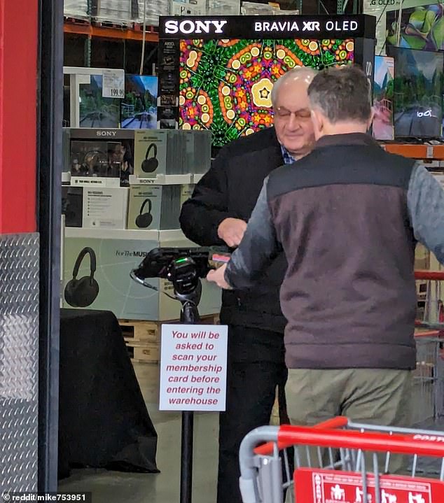 The photo shows the setup at the entrance to the Costco warehouse in Issaquah, Washington, that allows a store associate to view the photo associated with a membership card.