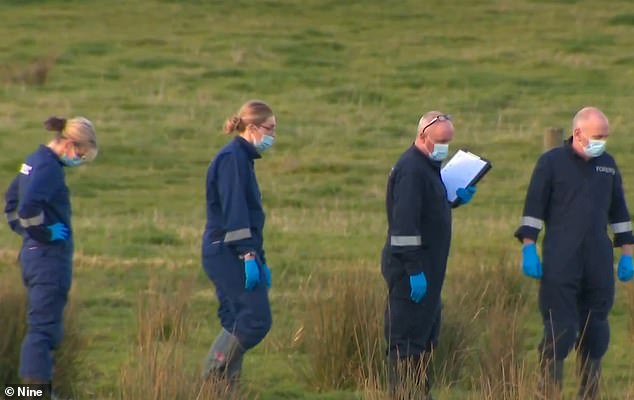 Forensic officers were seen scouring the nearby park after a man's body was found face down in a swamp