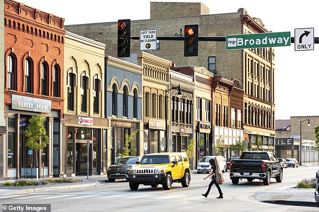 In the past, officials in North Dakota had to convince people to move there, but after the oil industry took over, population growth skyrocketed. (Photo: Main Street in downtown Fargo, ND)