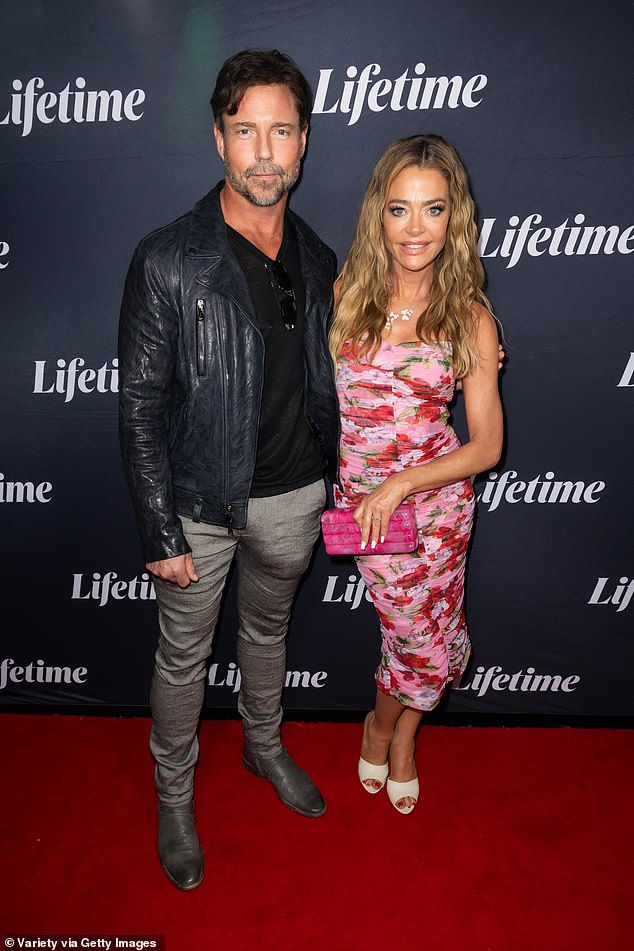 Denise Richards and her husband Aaron Phypers looked utterly happy during a date night at the premiere of Tempted by Love in Los Angeles