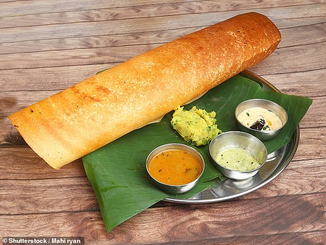 A tourist experienced 'love at first sight' at an Indian restaurant on the Malaysian island of Penang after trying dosa - a thin pancake - as pictured here (stock image)