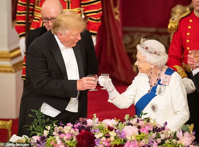 Cheers to you: Trump and Elizabeth II clinked glasses after their speech. The president normally drinks white grape juice at such gatherings, while the queen drank water