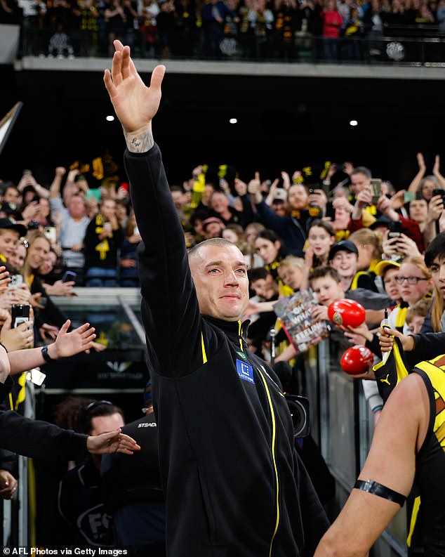 Martin couldn't hold back his tears in an incredibly rare display of emotion as he said goodbye to Tigers fans at the SCG on Saturday (pictured)