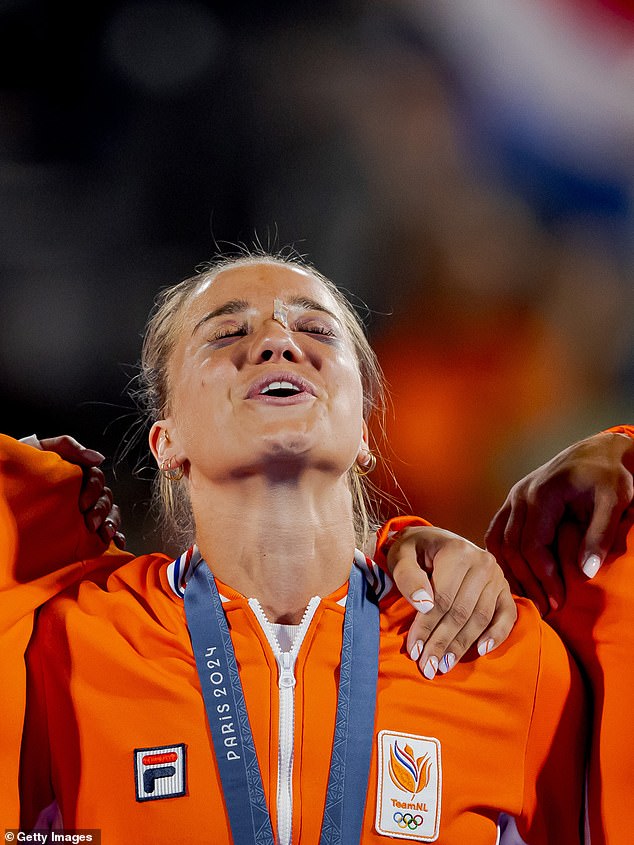 Dutch hockey player Joosje Burg appeared with two black eyes during the medal ceremony