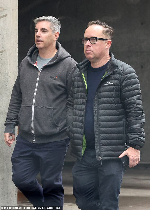 Former Qantas boss Alan Joyce (right) and his husband Shane Lloyd said on Thursday that he had been advised to take a year off, but refused to elaborate on his response to Australians' anger at the national airline.