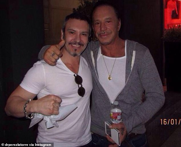 Latorre poses with actor Mickey Rourke