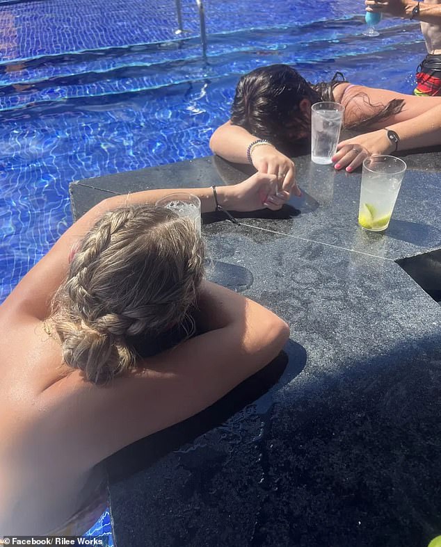 Officials in Mexico claim allegations two college students were drugged with fentanyl-laced drinks at a resort are false, which their families have now countered in a scathing post. Pictured: The students moments after the alleged spiking