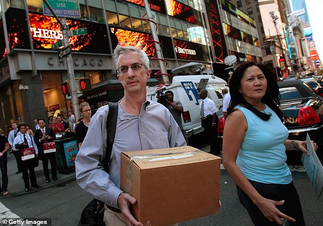 Rosenberg predicts that the U.S. economy is headed for another recession, with a struggling labor market as a catalyst. A Lehman Brothers employee is pictured leaving the office on September 15, 2008, the day the bankrupt financial services company filed for bankruptcy.