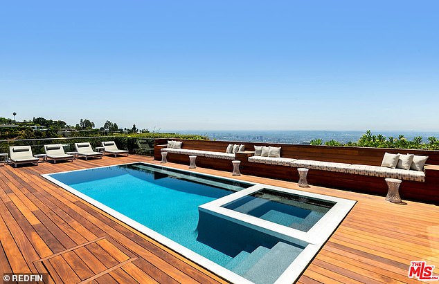 Its many attractions include an infinity pool and hot tub with panoramic city views, and a beautiful teak terrace