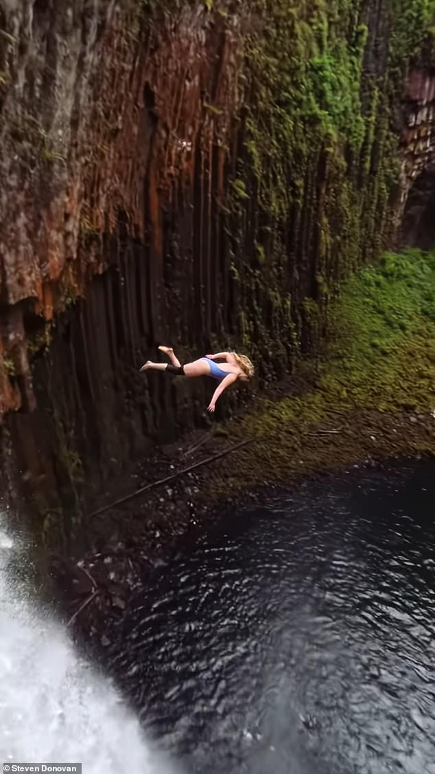 A breathtaking video has captured the moment a Norwegian woman broke the world record for the highest female 'Death Dive'