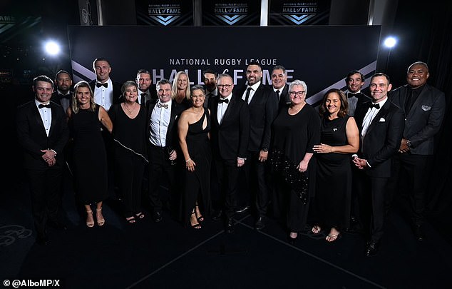 Albanese (center in photo) presented Coote with his individual award before rushing back to Canberra for more pressing matters