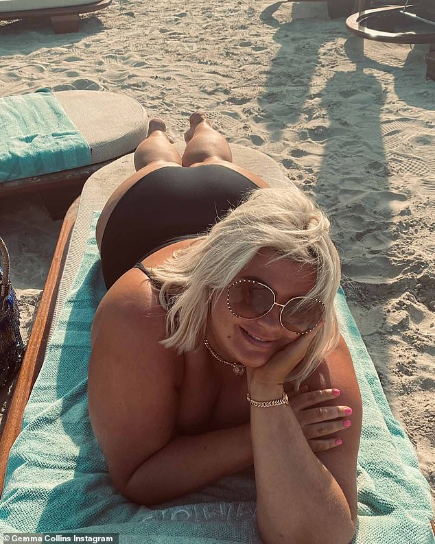 Gemma Collins showed off her curves as she shared a naughty snap of her swimsuit on Monday as she relaxed on the beach in a mystery location