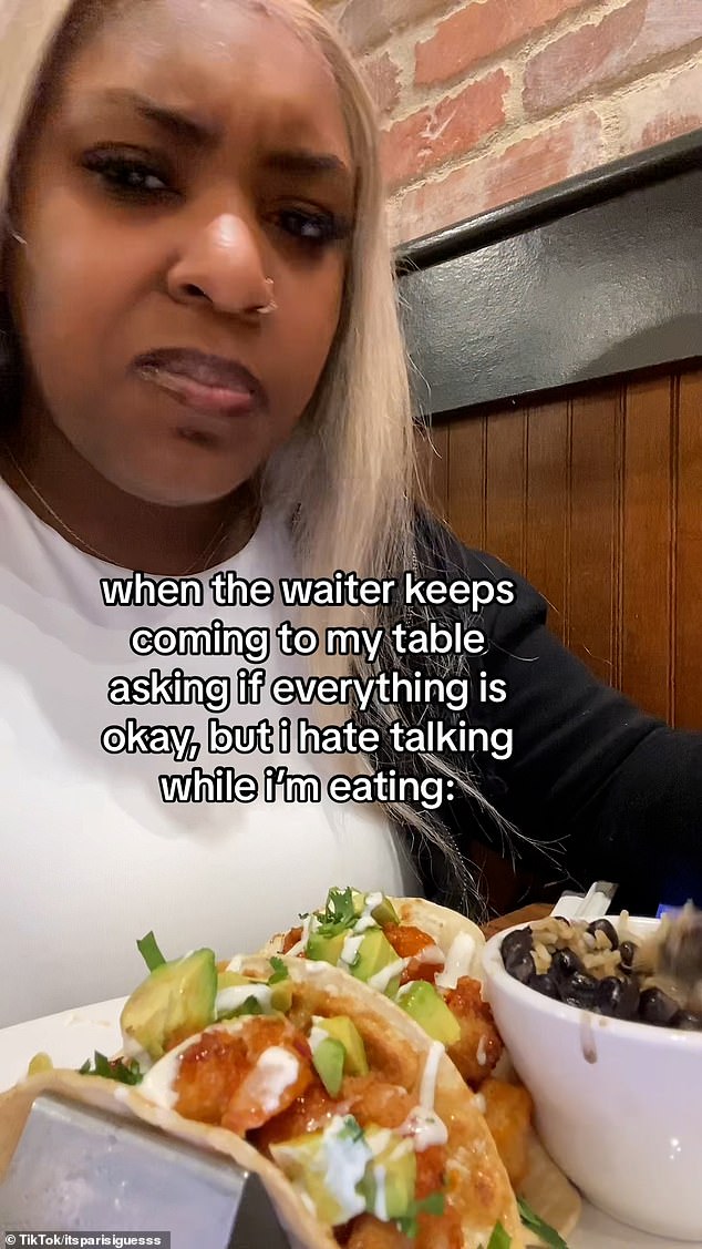 A growing number of younger customers don't want to interact with waiters, as they've 'grown up' by communicating through their phones and devices (pictured: a TikTokker posts a video showing her displeasure at having to talk to a waiter)