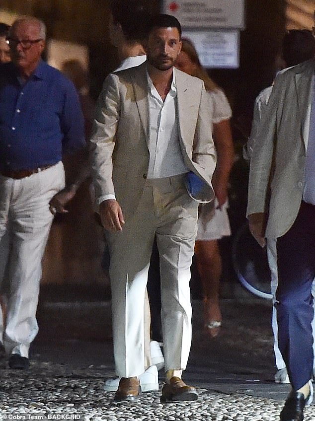 Strictly Come Dancing star Giovanni Pernice, 33, looked somber as he was spotted strolling the streets of Italy on Tuesday during a family holiday