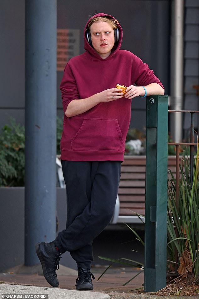 Karl Stefanovic's son Jackson (pictured) has been keeping a low profile. But on Friday, the 24-year-old was spotted striking a casual pose as he headed out for a quick bite to eat in Sydney