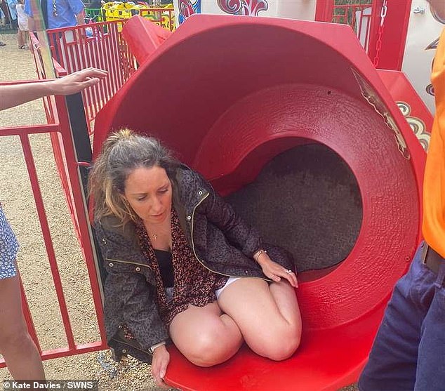 Kate Davies (pictured) was left with nasty cuts and briefly blurred vision after she and her three-year-old daughter Poppy were thrown from a teacup ride