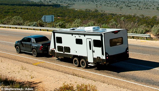 A car with a caravan has been stolen from a holiday park in central Queensland, with a young family of five inside (stock photo)