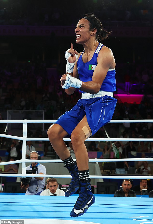 Imane Khelif celebrates her victory over Thai boxer Janjaem Suwannapheng today