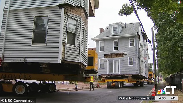 Residents of Hartford, Connecticut gathered Thursday to watch as four historic homes were moved through the streets