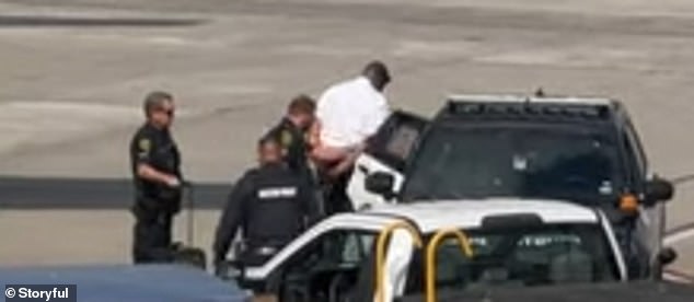 A Frontier Airlines pilot was arrested by Houston police on Saturday aboard a plane at George Bush Intercontinental Airport.