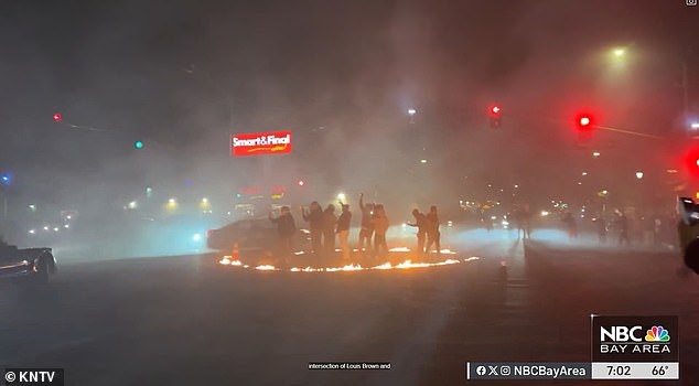 Terrifying footage shows people jumping into a ring of fire at an intersection in Vallejo, California, early Saturday morning