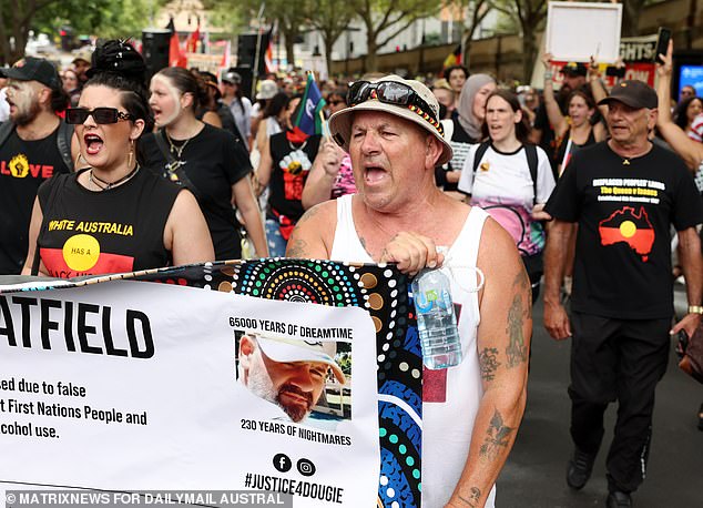 Pictured: People in Sydney protesting during an Invasion Day rally on January 26