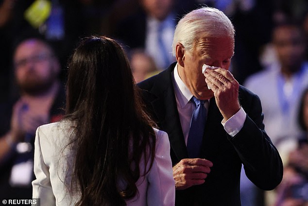 President Joe Biden wipes away a tear after being introduced by his daughter Ashley during the first day of the Democratic National Convention, a night that also saw relentless attacks on Donald Trump