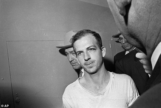 Some experts claim the documents will prove the CIA helped Lee Harvey Oswald (pictured) carry out the attack