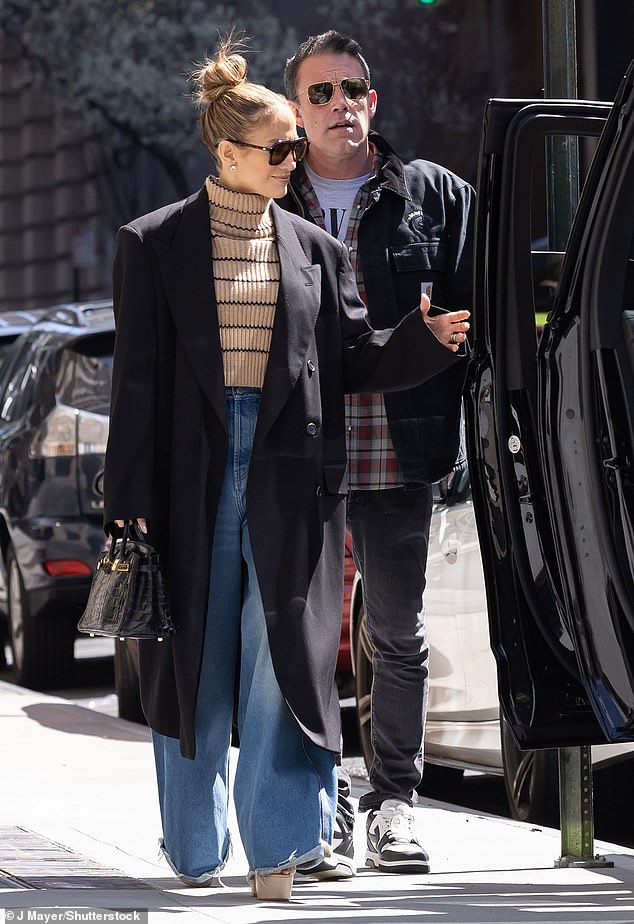 Fans have called Jennifer Lopez 'petty' after her 'revenge divorce' from Ben Affleck on the couple's second wedding anniversary. The couple pictured in March