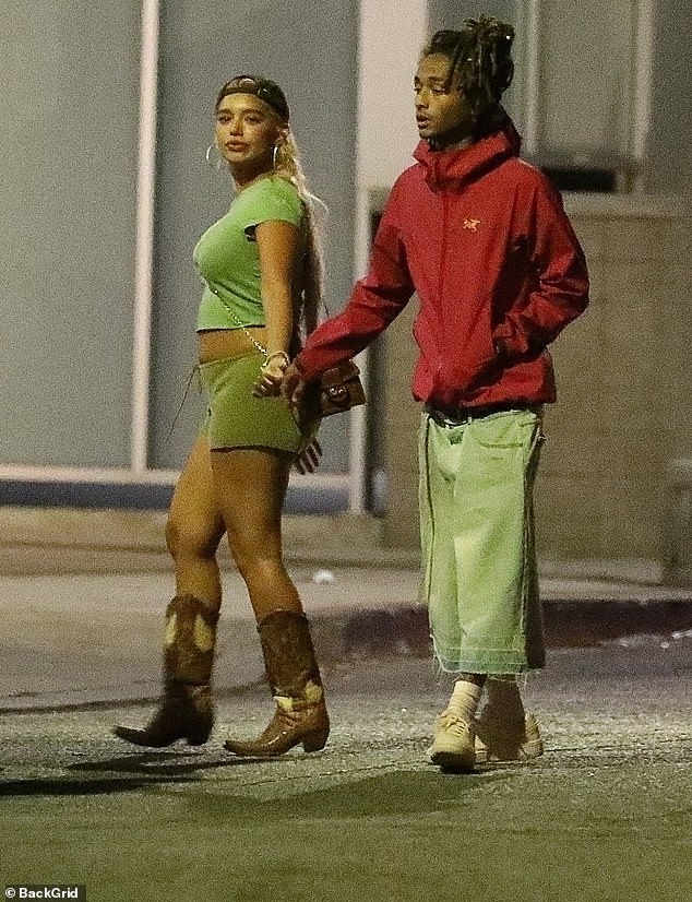 Jada Pinkett Smith and Will Smith's son wore a red hoodie with a pair of bright green, wide-leg, cropped pants