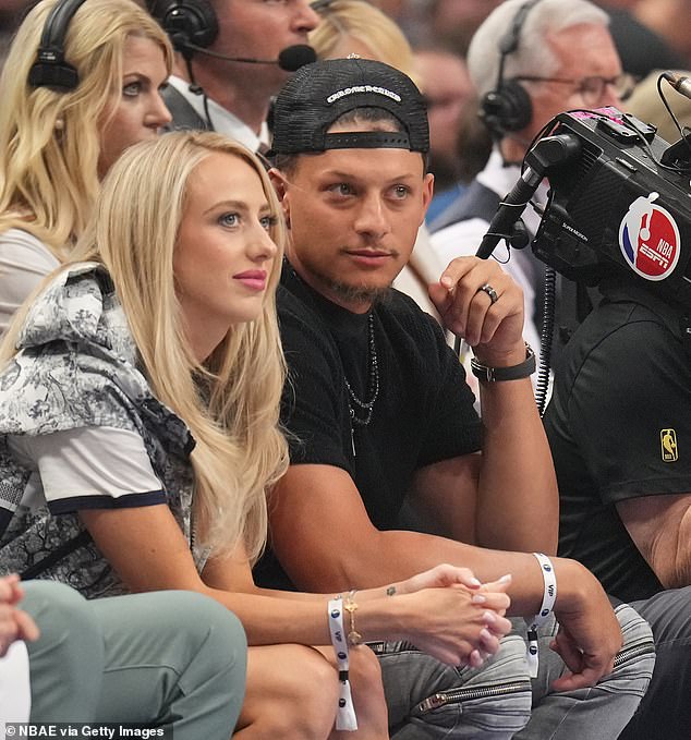 Brittany Mahomes and her husband Patrick are pictured at an NBA Finals game in Dallas