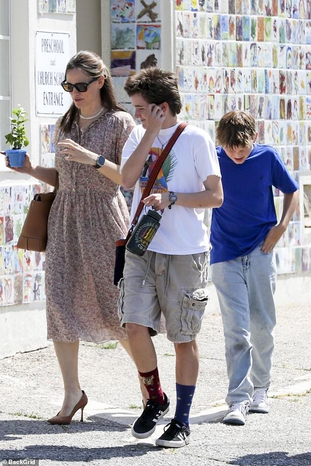 Jennifer Garner looked in high spirits on Sunday as she stepped out in Brentwood with Fin, 15, and Samuel, 12, who she shares with ex-husband Ben Affleck