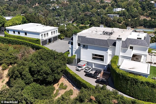 A U-Haul truck was spotted parked outside divorcing couple Jennifer Lopez and Ben Affleck's Beverly Hills mega-mansion on Thursday after reports she was 