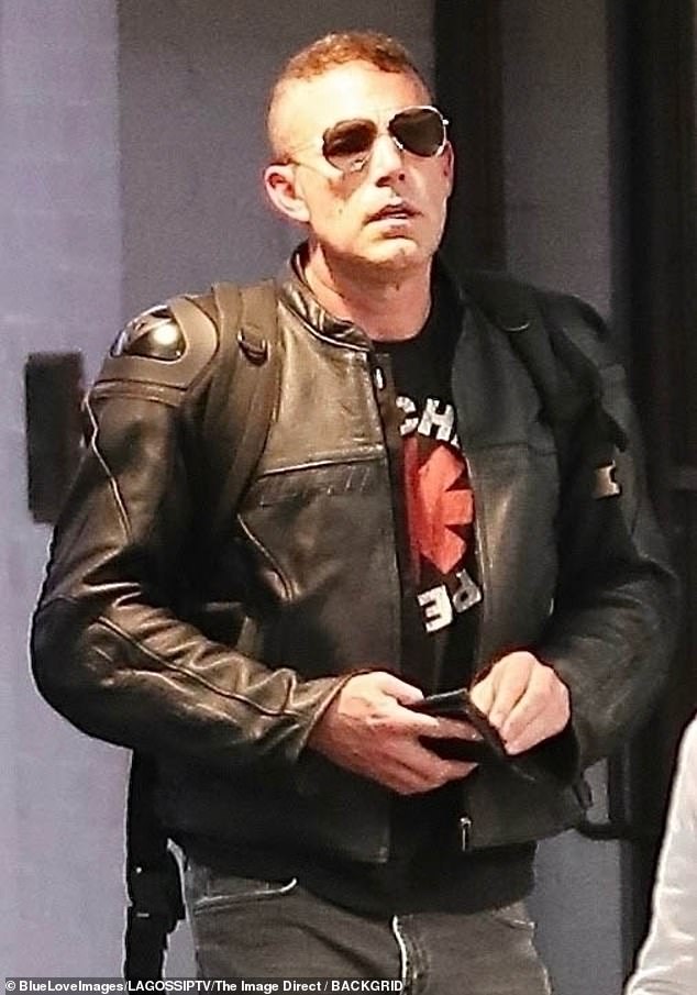 Affleck showed off his post-midlife crisis makeover in LA this past weekend, strutting his stuff in front of the paparazzi in his Travis Bickle-inspired mohawk and biker gear (pictured).