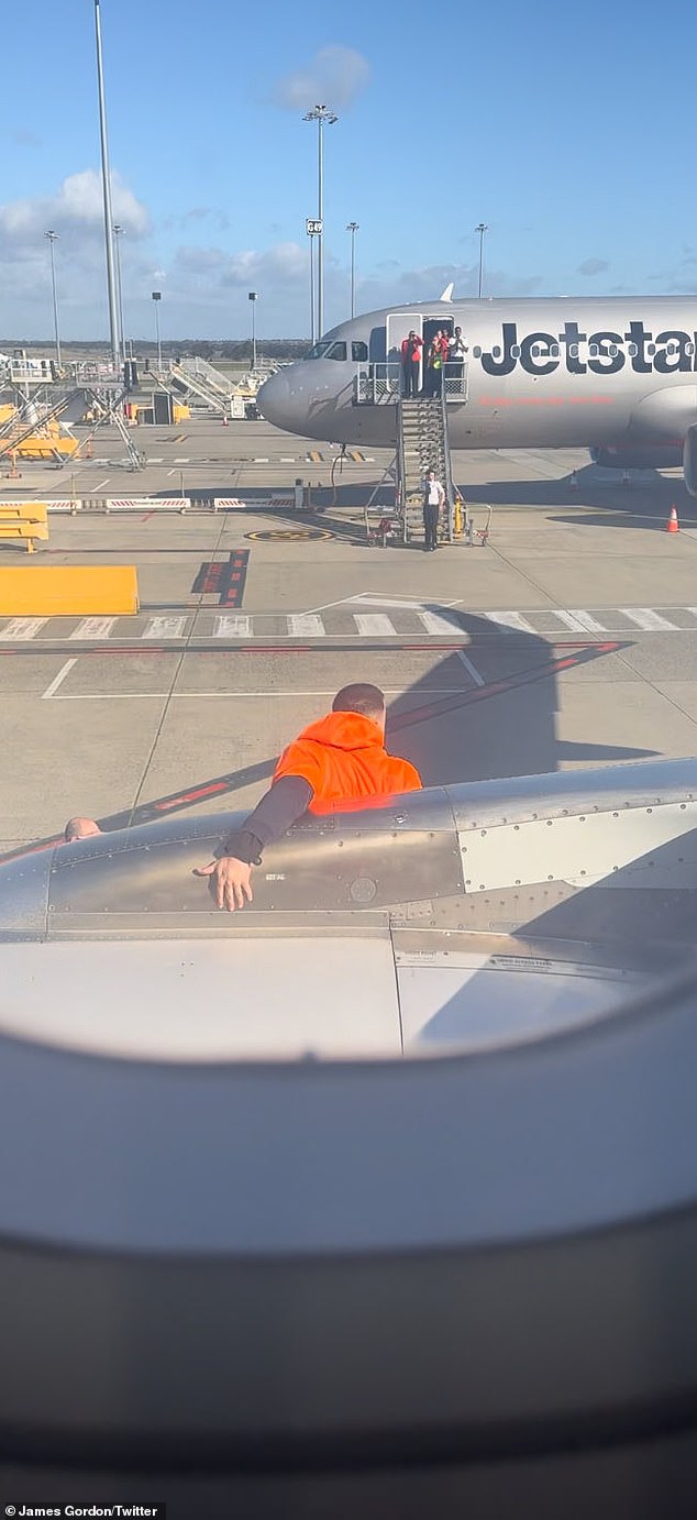 Jetstar nightmare Passenger opens emergency exit and slides out of