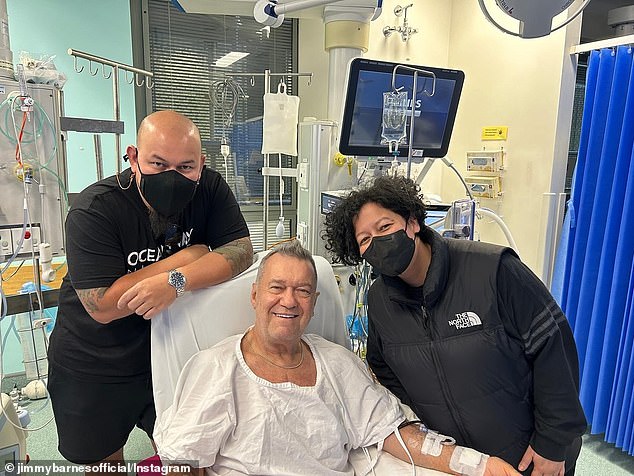 Jimmy Barnes has shared an update after suffering another health scare following open heart surgery and a hip replacement. Pictured with his children Jackie and Mahalia