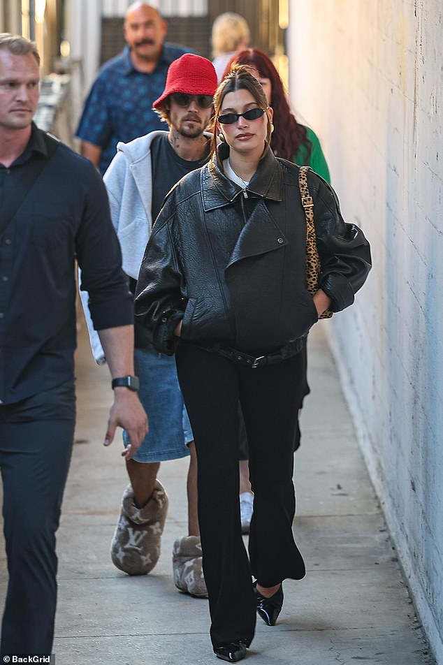 Hailey Bieber, 27, looked stylish in an all-black ensemble as she attended a church service in Beverly Hills with her husband Justin Bieber, 30, on Wednesday night.