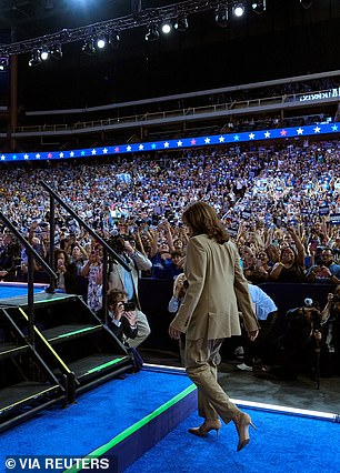 Harris almost suffered an embarrassing stumble as she jumped up the steps at Arizona rally