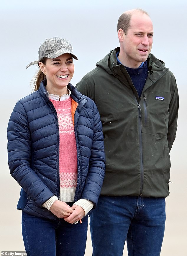 Prince William, Prince of Wales and Catherine, Princess of Wales on West Sands beach after taking part in a sand yachting session in St Andrews, Scotland in May 2021